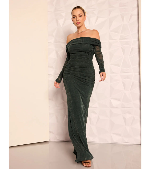 Shine bright in the Tova Off The Shoulder Glitter Mermaid Dress, a hunter green sparkly long sleeve dress crafted for winter formal events, NYE celebrations, and glamorous holiday outfits.