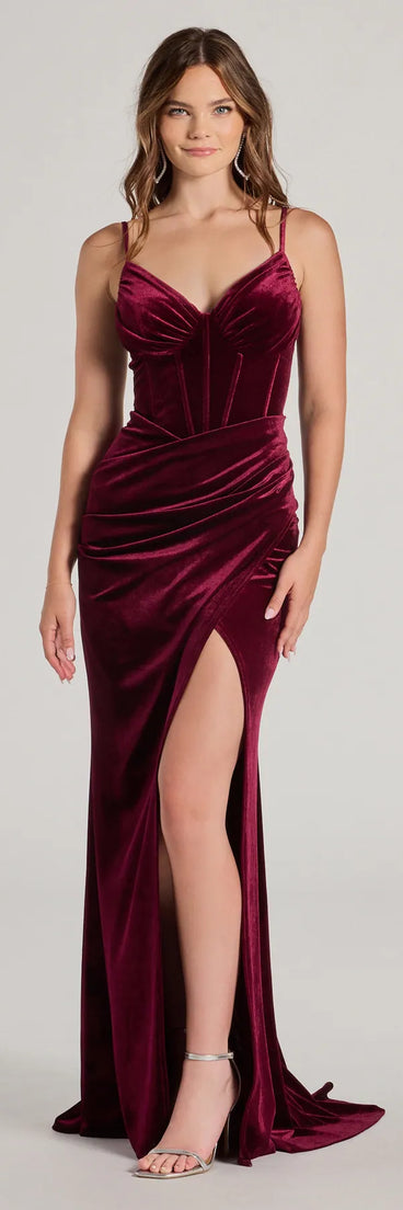 The Fia Sleeveless Velvet Wrap Corset Mermaid Dress is a burgundy holiday dress with a festive style, crafted from luxe fabrics and with unique design accents, a perfect pick as your holiday party dress.