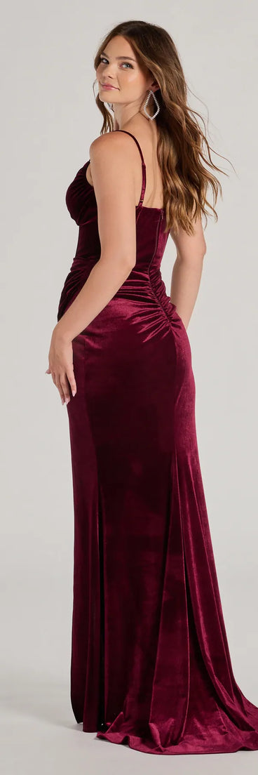 The Fia Sleeveless Velvet Wrap Corset Mermaid Dress in a vibrant hue is the perfect red holiday dress for seasonal celebrations from winter weddings and cocktail parties to holiday and New Year's Eve celebrations!