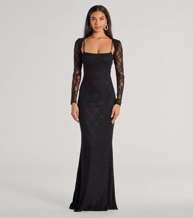 The Adele Sleeveless Lace Mermaid Dress With Bolero is an elegant black formal dress in a rich seasonal color and with unique design accents that make dressing up for winter parties, holiday balls, or festive gatherings effortless!