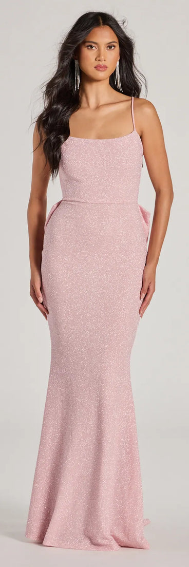 Turn heads at Prom 2025 in this pink prom dress, where statement-making details meet the iconic style of the Gwendolyn Glitter Knit Bow-Back Mermaid Dress .