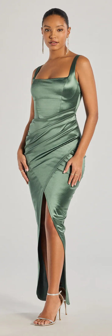 Turn heads at HOCO 2025 in this sage green homecoming dress, where statement-making details meet the iconic style of the Rebecca Satin Slim-Fit Formal Dress.