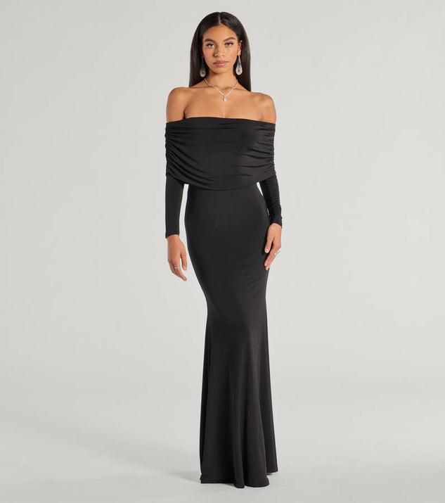 The Carmen Off-The-Shoulder Long Sleeve Mermaid Dress is an elegant black formal dress in a rich seasonal color and with unique design accents that make dressing up for winter parties, holiday balls, or festive gatherings effortless!