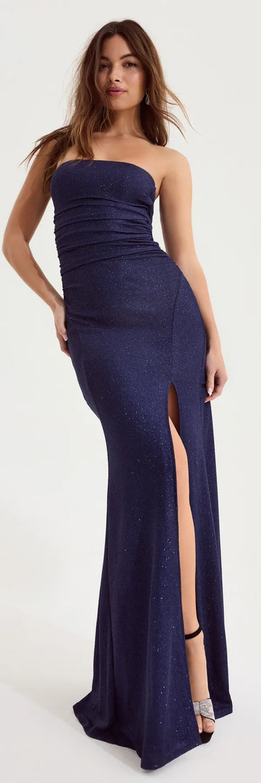 Turn heads at Prom 2025 in this denim prom dress, where statement-making details meet the iconic style of the Lilly Sleeveless High-Slit Glitter Slim Dress .