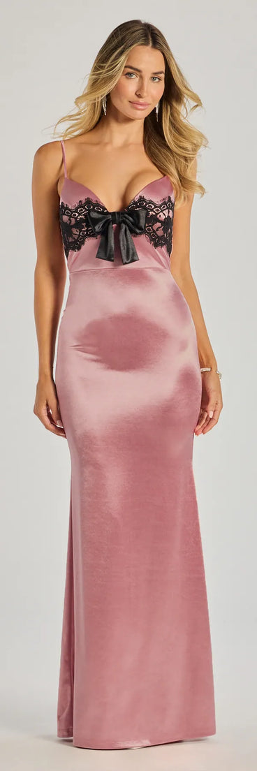 Turn heads at Prom 2025 in this blush prom dress, where statement-making details meet the iconic style of the Jayden V-Neck Lace Trim Bow Satin Mermaid Formal Dress .