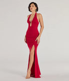 The Kindra High-Slit Mermaid Halter Dress is an elegant red formal dress in a rich seasonal color and with unique design accents that make dressing up for winter parties, holiday balls, or festive gatherings effortless!
