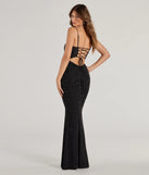 The Noa Lace-Up Rhinestone Corset Mermaid Dress is an elegant black formal dress in a rich seasonal color and with unique design accents that make dressing up for winter parties, holiday balls, or festive gatherings effortless!