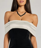 The Verona Off-The-Shoulder Bow Back Velvet Formal Dress is an essential holiday or NYE dress that pairs chic style with versatility making it perfect for cocktail events, New Year's Eve parties, or as a winter wedding guest look.