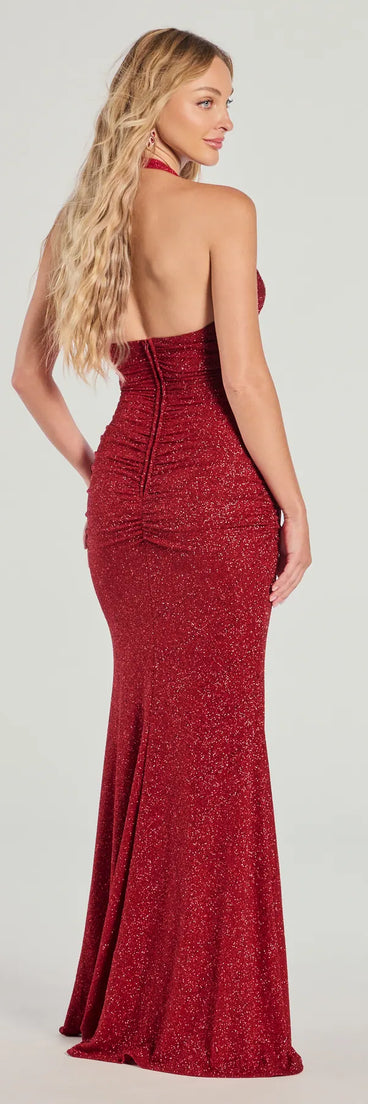 Make a statement in the Gretchen Halter Slit Slim Glitter Formal Dress, a bold red prom dress designed to exude confidence, elegance, and a striking prom-night look.