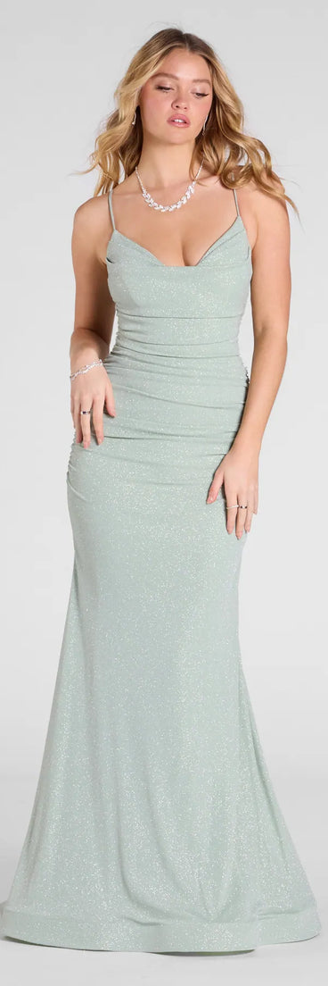Own the spotlight in the Leslie Lace-Up Mermaid Glitter Formal Dress, a sage green formal dress crafted to deliver luxe style for autumn weddings, Military Balls, or any special event.
