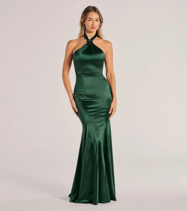 The Hallie Satin Sleeveless Halter Mermaid Dress is a hunter green dress, an essential holiday or NYE dress that pairs chic style with versatility making it perfect for cocktail events, New Year's Eve parties, or as a winter wedding guest look.