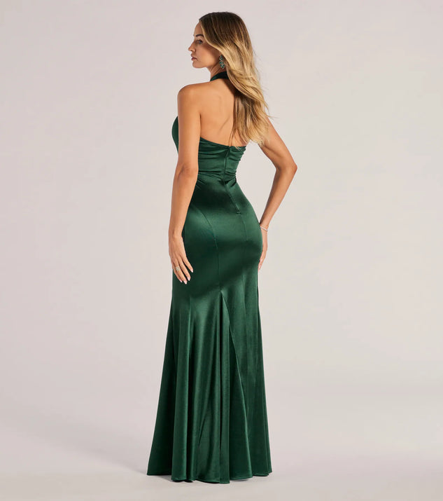 The Hallie Satin Sleeveless Halter Mermaid Dress is a hunter green dress, an essential holiday or NYE dress that pairs chic style with versatility making it perfect for cocktail events, New Year's Eve parties, or as a winter wedding guest look.