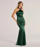 The Hallie Satin Sleeveless Halter Mermaid Dress is a hunter green dress, an essential holiday or NYE dress that pairs chic style with versatility making it perfect for cocktail events, New Year's Eve parties, or as a winter wedding guest look.