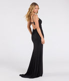 The Rhonda Strappy Back Slit Glitter Formal Dress is a show-stopping black prom dress, offering a sleek, slimming silhouette that enhances your natural beauty for an unforgettable night.