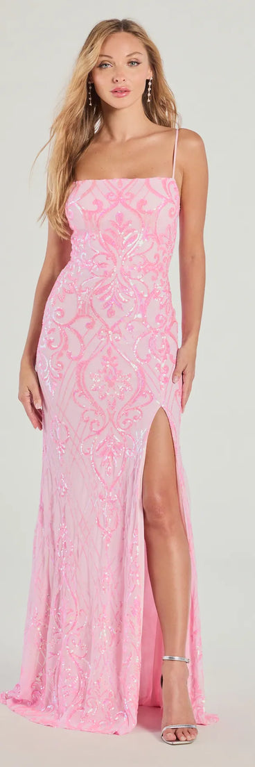 Own the spotlight in the Tabitha Sleeveless Sequin Formal Column Dress, a pink formal dress crafted to deliver luxe style for autumn weddings, Military Balls, or any special event.