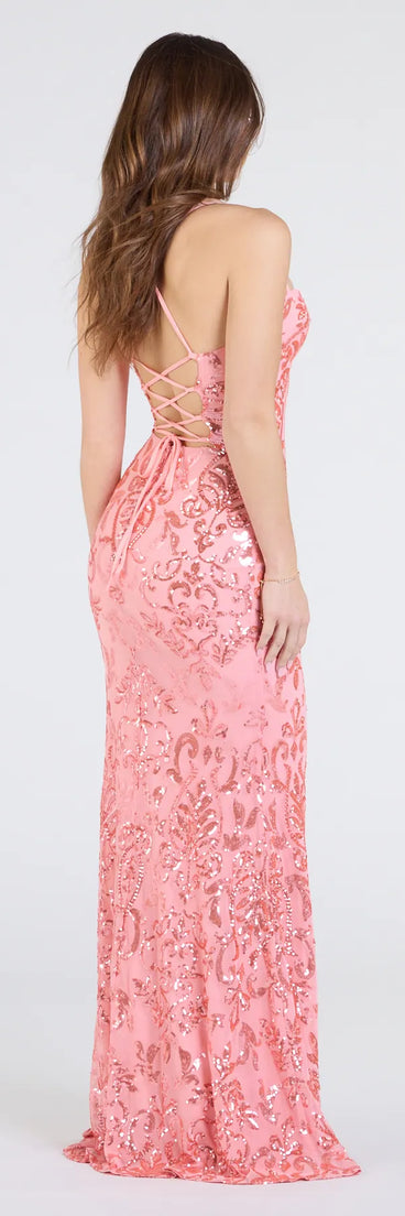 Flaunt your silhouette in the tight Shelby Lace-Up Slit Sequin Formal Dress in coral, a bodycon dress that empowers your look with bold style and effortless edge.