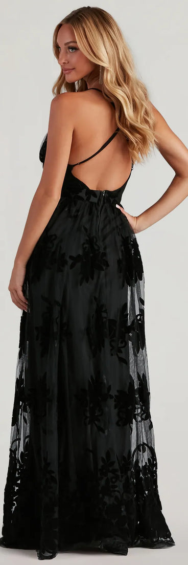 The Morgan Flocked Velvet A-Line Formal Dress is a show-stopping black prom dress, offering a sleek, slimming silhouette that enhances your natural beauty for an unforgettable night.
