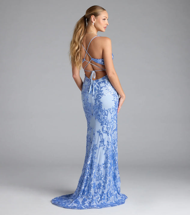 Turn heads at Prom 2025 in this periwinkle prom dress, where statement-making details meet the iconic style of the Jaide Lace-Up Corset Slit Sequin Formal Dress.