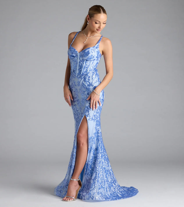Turn heads at Prom 2025 in this periwinkle prom dress, where statement-making details meet the iconic style of the Jaide Lace-Up Corset Slit Sequin Formal Dress.