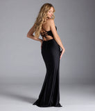 Turn heads at Prom 2025 in this black prom dress, where statement-making details meet the iconic style of the Carena Corset Lace-Up Slit Formal Dress.