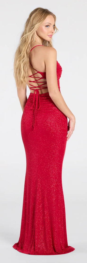Make a statement in the Diane Lace-Up Slit Mermaid Glitter Formal Dress, a bold red prom dress designed to exude confidence, elegance, and a striking prom-night look.