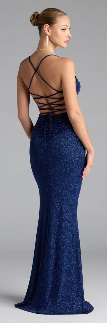 Turn heads at Prom 2025 in this navy blue prom dress, where statement-making details meet the iconic style of the Diane Lace-Up Slit Mermaid Glitter Formal Dress.