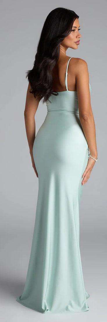 Own the spotlight in the Marcie Cowl Neck Slit Mermaid Formal Dress, a mint green formal dress crafted to deliver luxe style for autumn weddings, Military Balls, or any special event.