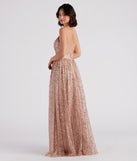 Make a statement in the brilliant Stacy Glitter Sequin Tulle Ball Gown, a glittery gold dress designed to shine at any occasion, from Winter Formals to elegant evening soirees.