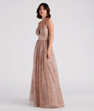 Dazzle at your next event with the glitzy Stacy Glitter Sequin Tulle Ball Gown, a stunning gold glitter dress featuring sparkling details ideal for holiday parties or formal gatherings from galas to Winter Formal dances.