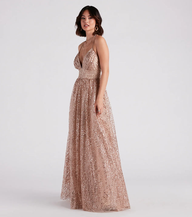 Dazzle at your next event with the glitzy Stacy Glitter Sequin Tulle Ball Gown, a stunning gold glitter dress featuring sparkling details ideal for holiday parties or formal gatherings from galas to Winter Formal dances.