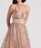 Make a statement in the brilliant Stacy Glitter Sequin Tulle Ball Gown, a glittery gold dress designed to shine at any occasion, from Winter Formals to elegant evening soirees.