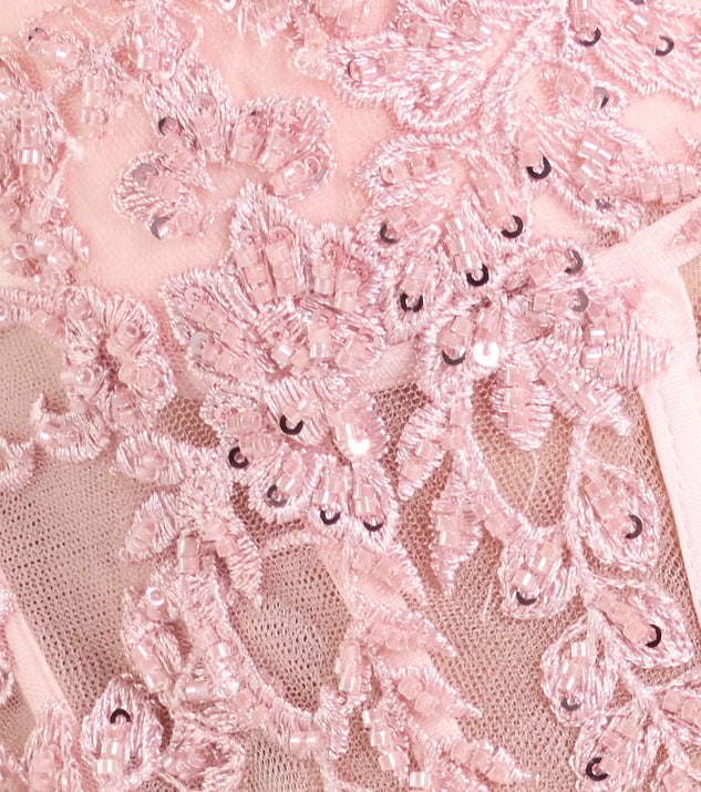 Turn heads at Prom 2025 in this pink prom dress, where statement-making details meet the iconic style of the Mae Corset Lace-Up A-Line Ball Gown.