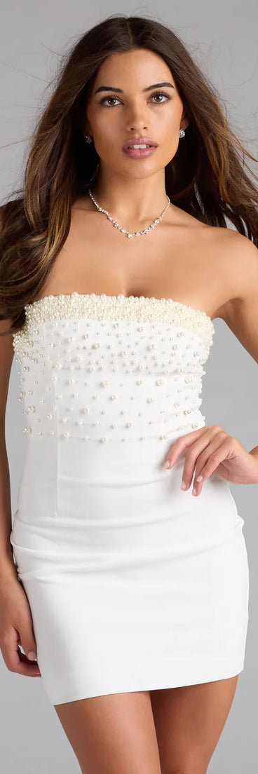 Shine with confidence, elegance, and standout style in the Chic Glamour Pearl Trim Mini Dress—a white homecoming dress designed with a fresh silhouette and the latest trends.