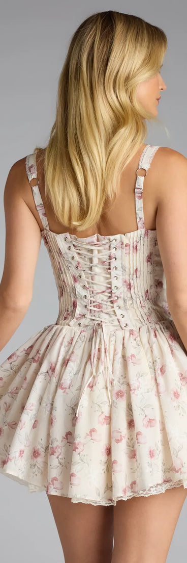 Feel ready for every dance floor moment or feed-worthy reel in the Laced Up And Lovely Floral Corset Dress, a natural homecoming dress designed to own your moment.