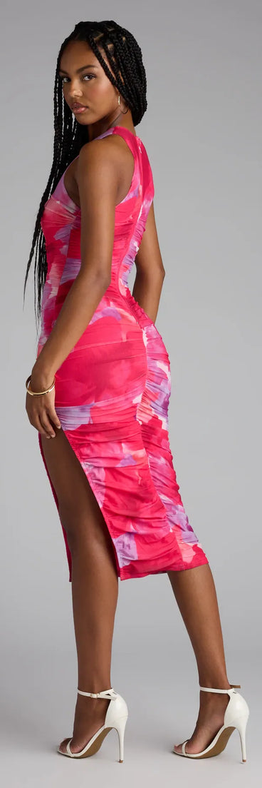The Made To Amaze Abstract Slit Midi Dress in pink features a flattering fit and mid-calf hem, redefining effortless midi dresses for any occasion.