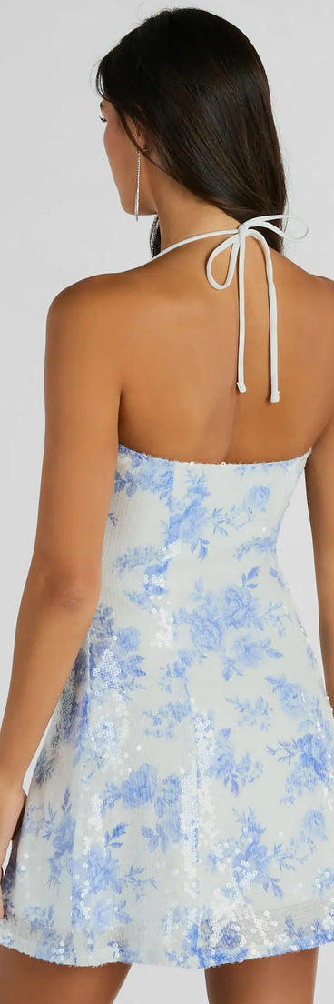 The Sparkly Excellence Floral Sequin Mini A-Line Dress is a mini dress that will make a statement with its short hemline and on-trend details to have you ready for any event!