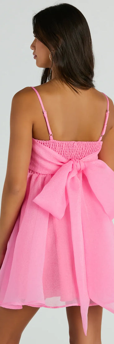The Babe Of The Hour Sleeveless Bow Back Babydoll Dress is a mini dress that will make a statement with its short hemline and on-trend details to have you ready for any event!