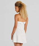 The Sweet And Sassy Strapless Scuba Knit Skater Dress is a mini dress in white, perfect for an above-the-knee holiday party dress or a stylish NYE look, with a short hemline designed to make a winter statement.