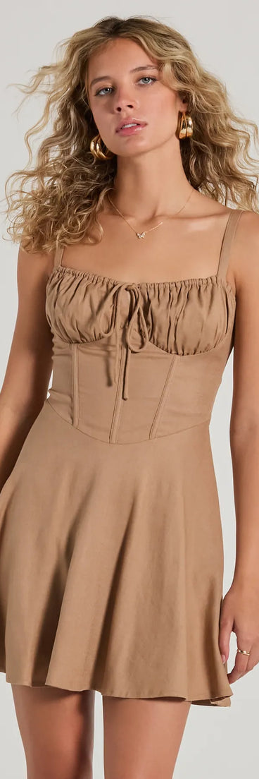 Feel confident and photo-ready in the Bold New Look Corset Lace-Up Linen Skater Dress, a natural graduation dress perfect for 2025 ceremonies and parties.