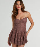 Step into winter chic with the Romance Dreamer Sweetheart A-Line Lace Mini Dress, a mauve mini dress featuring an above-the-knee cut ideal for cocktail parties, festive gatherings, or clubwear.