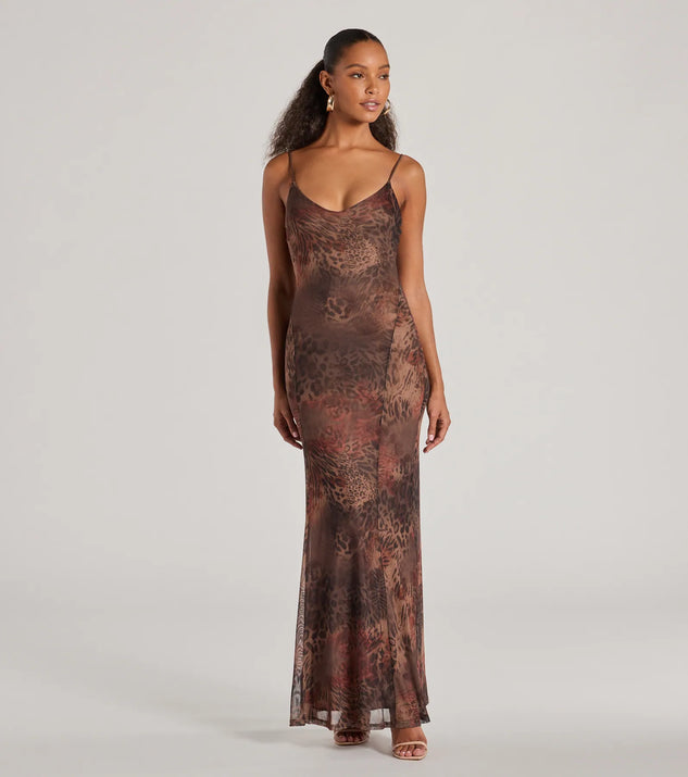 The Fierce Allure Leopard Print Mesh Maxi Dress is a leopard print dress, an essential holiday or NYE dress that pairs chic style with versatility making it perfect for cocktail events, New Year's Eve parties, or as a winter wedding guest look.