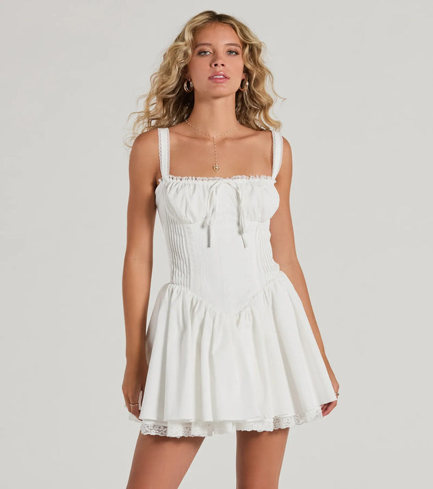 Step into winter chic with the So Darling Woven Drop-Waist Skater Dress, a white mini dress featuring an above-the-knee cut ideal for cocktail parties, festive gatherings, or clubwear.