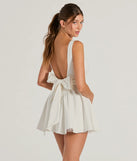 The Stunning Sweetie Open Back Bow Skater Dress is a ivory dress, an essential holiday or NYE dress that pairs chic style with versatility making it perfect for cocktail events, New Year's Eve parties, or as a winter wedding guest look.