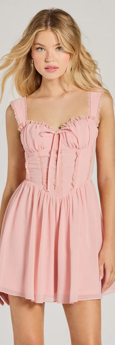 Step into seasonal chic with the Such A Flirt Sweetheart Lace Trim Skater Dress, a pink mini dress featuring an above-the-knee cut ideal for cocktail parties, festive gatherings, or clubwear.