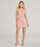 Step into winter chic with the Such A Flirt Sweetheart Lace Trim Skater Dress, a pink mini dress featuring an above-the-knee cut ideal for cocktail parties, festive gatherings, or clubwear.