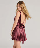 The Captivating Charm Sleeveless Tie Back Satin Skater Dress is a mini dress that will make a statement with its short hemline and on-trend details to have you ready for any event!
