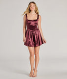 The Captivating Charm Sleeveless Tie Back Satin Skater Dress is a mini dress that will make a statement with its short hemline and on-trend details to have you ready for any event!