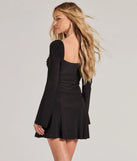 The Pretty Style Bell Sleeve A-Line Mini Dress is a mini dress in black, perfect for an above-the-knee holiday party dress or a stylish NYE look, with a short hemline designed to make a winter statement.