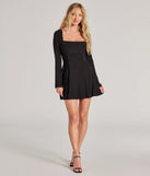 The Pretty Style Bell Sleeve A-Line Mini Dress is a stunning black mini dress with a short hem, designed to be the perfect winter cocktail dress or night-out look for the holiday season.