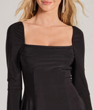 Step into winter chic with the Pretty Style Bell Sleeve A-Line Mini Dress, a black mini dress featuring an above-the-knee cut ideal for cocktail parties, festive gatherings, or clubwear.